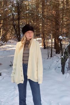 "Vintage oversized cream ribbed knit cardigan sweater! Chunky + thick acrylic knit - not scratchy! Shawl collar, deep v with buttons down the front and pockets! Unlined. Label: Sears Best Condition: In great vintage condition. Some minor pilling. Measurements: Seems to best fit a size large / oversized Bust: 44\" Sleeve: 27\" Overall Length: 29\" For reference, model is 5'9\" and measures 34/29/40 All measurements are taken flat and then doubled when appropriate. Please let us know if you have a Cozy Oversized Ribbed Cardigan, Cozy Ribbed Winter Cardigan, Oversized Ribbed Winter Outerwear, Oversized Ribbed Sweater Coat For Winter, Oversized White Ribbed Outerwear, Classic Chunky Knit Sweater Coat For Winter, Cream Ribbed Knit Cardigan, Winter Beige Ribbed Outerwear, Classic Oversized Ribbed Cardigan