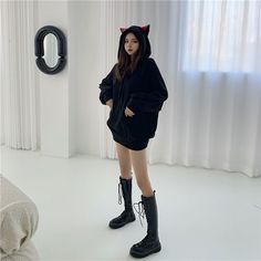 You can now unleash your inner feline with this playful & cool kawaii hoodie with ears! Inject a touch of whimsy into your wardrobe for a kawaii look with our Harajuku-style Kawaii cat hoodie with ears. Come in a sleek black color, this hoodie brings out a unique blend of cool and kawaii at the same time, making it a standout piece for all the fashionable cat moms out there that wanna look bold and different. Features a vibrant red cat ears, this cat hoodie adds a fun pop of color that completes Kawaii Black Hoodie For Fall, Kawaii Long Sleeve Hoodie With Cat Design, Black Kawaii Hoodie For Fall, Casual Halloween Cosplay Hoodie, Kawaii Winter Hoodie For Loungewear, Black Kawaii Hoodie For Winter, Kawaii Cosplay Hoodie For Winter, Kawaii Winter Cosplay Hoodie, Black Hoodie With Cat Design