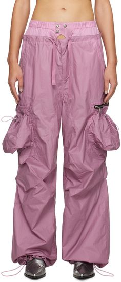 Nylon taffeta cargo pants. · Paneled construction · Cutout at elasticized waistband · Drawstring at layered waistband · Two-pocket styling · Zip-fly · Bungee-style drawstring at cuffs · Zip and patch pockets at outseam · Flap pocket at back Supplier color: Dusty pink Nylon Cargo Pants With Functional Drawstring, Utility Nylon Parachute Pants With Drawstring, Nylon Techwear Parachute Pants With Functional Drawstring, Utility Nylon Cargo Pants With Functional Drawstring, Spring Nylon Parachute Pants With Cargo Pockets, Spring Parachute Pants With Cargo Pockets, Utility Nylon Parachute Pants With Cargo Pockets, Utility Parachute Pants With Functional Drawstring, Spring Nylon Cargo Pants With Multiple Pockets