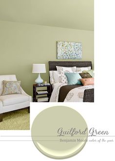 a bedroom with green walls and furniture in the room, along with a white chair