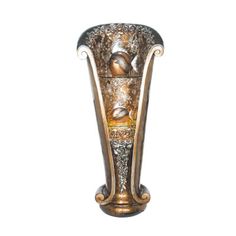 an ornate vase is shown against a white background