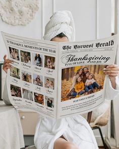 a woman sitting in a chair while holding up a large newspaper with photos on it