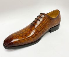 Style: 503-67E-Cognac Unique Crocodile Printed Embossed Calfskin lace-up Oxford from our Carrucci by Maurice collection features soft Calfskin lining, a clean welt, and a Rubber Sole!