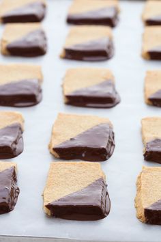 chocolate and graham crackers on a baking sheet