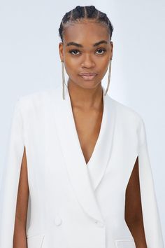 Get the party started in this sophisticated blazer dress. A new take on after-dark styling, it offers up an alluringly androgynous feel, fuelled with fierce feminine energy. The crisply tailored silhouette showcases double-breasted buttons, a swishy cape-style back and flap pockets for that continued nod to menswear.Style: Blazer DressFabric: SatinLength: MiniNeckline: CollaredSleeve Length: Long Sleeve Cape Style, Style Blazer, Get The Party Started, Feminine Energy, Blazer Dress, Sleeve Detail, After Dark, Dress Fabric, Dress Collection