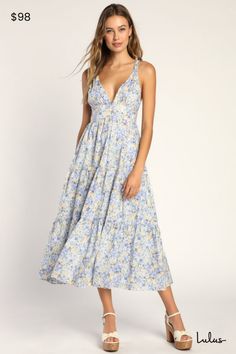 Your sweet disposition calls for a sweet dress to match, and the Lulus Brightly Blossoming Light Blue Floral Tiered Midi Dress will be a perfect fit! Lightweight woven cotton boasts a lush floral print as it shapes braided straps that support a V-neck bodice, atop a banded waist. Tiered skirt has an A-line silhouette, side pockets, and falls to a sunny midi hem. Hidden back zipper/clasp. Fit: This garment fits true to size. Length: Mid-calf length. Size medium measures 49" from shoulder to hem. Bust: Great for any cup size. Waist: Fitted - very fitted at natural waist. Hip: Not Fitted - fuller skirt allows room for hips. Undergarments: May be worn with petals, or no bra. Fabric: Fabric has no stretch. Lined. Shell: 100% Cotton. Lining: 88% Polyester, 12% Spandex. Hand Wash Cold. Do Not Ble Light Blue Midi Dress, Sweet Disposition, Maternity Midi Dress, Floral Print Midi Dress, Tiered Midi Dress, Floral Blue Dress, Wedding Outfits, Blue Midi Dress, Sweet Dress