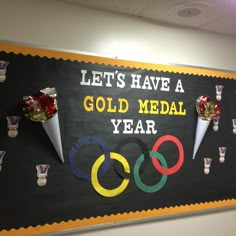 a bulletin board that says, let's have a gold medal year in front of the olympics