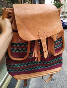 "Welcome! Amazing Vintage Leather and fabric Backpack In very good condition, i think never use A lot of pockets Measures: H: 14.56\" (37 cm) W: 13.77\" (35 cm) Deep: 3.54\" (9 cm) Thanks for stopping by!!IMPORTANT: Due to the delicate situation We're all going through, and in order to keep the safety of courier workers too, all orders will be dispatched when alert sanitary finished. You can purchased or reserve items like always. Thanks so much for your understanding." Vintage Satchel Backpack For Trip, Leather-backed Backpack Shoulder Bag For Trips, Leather Backed Shoulder Bag Backpack For Trips, Leather-backed Shoulder Bag Backpack For Trips, Vintage Satchel With Leather Handles In Backpack Style, Casual Travel Satchel With Leather Backing, Casual Leather-backed Satchel For Travel, Travel Backpack With Leather Backing And Flap, Travel Satchel With Leather Backing And Flap