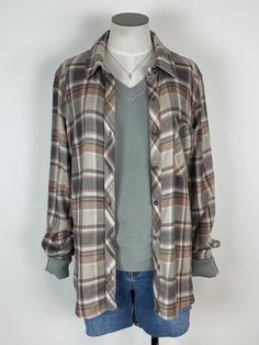 Indulge in comfort and style with the Kendall Plaid Button Down in Multi. This soft and cozy flannel features a button-down design and front chest pocket, making it cute and practical. Perfect for any occasion, it's the ultimate blend of comfort and fashion - you won't want to take it off! Length: 27.5" 100% Rayon Brand: Be Cool Relaxed Fit Button-up Flannel Shirt For Casual Gatherings, Fall Casual Tops With Buttoned Pockets, Cozy Plaid Long Sleeve Flannel Shirt, Cozy Plaid Flannel Shirt, Oversized Flannel Shirt For Everyday, Casual Flannel Outerwear With Relaxed Fit, Casual Winter Shirt With Buttoned Pockets, Cozy Button-up Top For Everyday, Oversized Casual Flannel Shirt