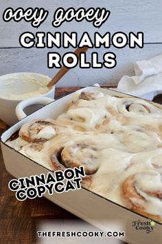 cinnamon rolls with icing in a casserole dish