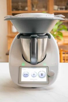 a blender sitting on top of a white counter