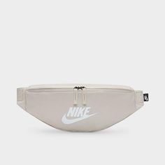 a white nike fanny bag with the logo on it