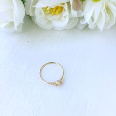 Tiny Pink Pearl Ring with genuine freshwater pearl & 14K gold filled, rose gold filled or sterling silver 💖 Dainty & sweet ring with a unique design for everyday wear, make a cute pinky ring & a lovely June birthstone gift for her Sizing: *Gemstone Diameter: 4 mm *Ring Band: 0.8 mm * Handmade in your ring size with 14K gold-filled or sterling silver wire and Natural Freshwater Pearl. * 14K gold-filled wire is known for its lasting quality. This ring will last for decades and is cons Delicate Gold Stackable Pearl Ring, Delicate Rose Gold Pearl Ring In 14k, Adjustable Rose Gold Pearl Drop Jewelry, 14k Gold Filled Rose Gold Stackable Rings For Anniversary, Rose Gold 14k Gold Filled Stackable Rings For Anniversary, Hypoallergenic 14k Gold Filled Wedding Rings, Stackable Rose Gold Pearl Ring For Promise, Rose Gold Pearl Jewelry With Wire Wrapped Detail, Dainty 14k Rose Gold Pearl Ring