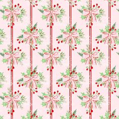 a pink background with green and red bows, holly leaves and mists on it