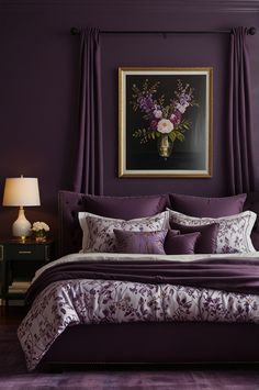 a bed with purple sheets and pillows in front of a painting on the wall above it