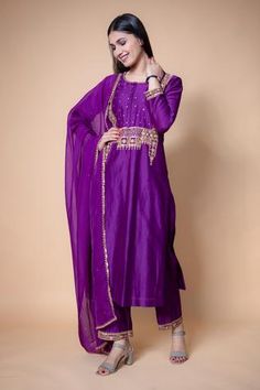 Purple chanderi silk kurta with embroidered floral motifs. Paired with embroidered pant with sequins work hem and tissue organza sheer dupatta.
Component: 3
Pattern: Embroidered
Type Of Work: Sequins, Floral
Neckline: Round
Sleeve Type: Full sleeves
Fabric: Chanderi silk, Tissue organza
Color: Purple
Other Details: 
Sequins embroidered cuffs and bodice
Floral embroidered dupatta
Occasion: Puja, Mehendi - Aza Fashions Ikshita Choudhary, Sheer Dupatta, Embroidered Cuffs, Suit Salwar, Kurta Set For Women, Embroidery On Kurtis, Kurti Embroidery Design, Silk Kurta, Embroidered Pants