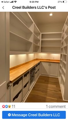 an empty room with lots of shelves and drawers