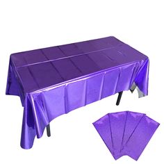 a purple table cloth with matching napkins