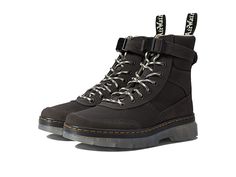 Dr. Martens Combs Tech - Shoes : Gunmetal Super Knit Soho Buck Hi Suede WP : High step into the lightweight design and supportive feel of the Dr. Martens Combs Tech utilitarian combat boot. Ajax leather and Extra Tough Poly upper. Ajax leather is a PU-coated split leather with a subtle geometric emboss. Built with classic Dr. Martens DNA including grooved edges, an AirWair™ heel loop, and visible stitching. Traditional lace-up system with flecked fabric laces and tonal eyelets for a secure fit. Fabric Doc Martens, Leather Moto Boots With Laces For Streetwear, Leather Hiking Boots For Fall Streetwear, Leather Footbed Combat Boots For Outdoor Fall Activities, High-top Leather Combat Boots For Work, Casual Combat Boots With Vibram Sole For Work, Fall Outdoor Combat Boots With Leather Footbed, Fall Leather Combat Boots For Outdoor, Outdoor Leather Combat Boots With Laces