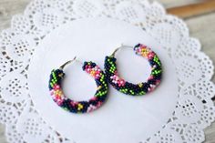 Matching necklace https://www.etsy.com/listing/523093199Beaded hoop earrings! They will be a wonderful accessory for any of your style!READY TO SHIP!The diametrs are:1.5" (3.8 cm)1.7 " (4.3 сm)1.9 " (4.8 cm)2.2 " (5.5 cm)❤ CUSTOM ORDERSIt is ABSOLUTELY HANDMADE . So if you like this item in a different color or size, send me a message please. I will send you a link for a "custom order" and you'll be able to place the order there. Please feel free to communicate with me.SHIPPINGItem will be shipp Handmade Bohemian Flower Hoop Earrings, Bohemian Flower Shaped Handmade Hoop Earrings, Bohemian Handmade Flower Hoop Earrings, Handmade Hoop Flower Earrings For Summer, Handmade Summer Flower Hoop Earrings, Handmade Flower Hoop Earrings For Summer, Romantic Embroidery, Embroidery Earrings, Native American Beading