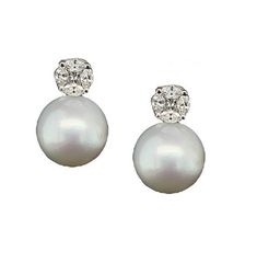 These elegant South Sea pearl and diamond earrings are a timeless classic for any high jewelry collection. The 11.50mm South Sea pearls are stunning - perfectly round and blemish-free, with gorgeous luster! We have paired these gems with diamond "rounds" created by arranging sparkling marquise-shaped diamonds around princess cut centers, giving the illusion of larger, single diamonds! Large pearl earrings are a statement of refinement, sophistication and natural beauty. These earrings belong in Elegant Platinum Diamond Earrings For Formal Occasions, Elegant White Bridal Earrings With Single Cut Diamonds, Classic White Gold Pearl Earrings, Luxury Diamond Pearl Earrings For Formal Occasions, Luxury Diamond Pearl Earrings For Formal Events, Luxury Pearl Earrings With Diamond Accents, Elegant Platinum Bridal Earrings, Luxury Platinum Pearl Earrings For Formal Occasions, Luxury Diamond Earrings With Pearl Drop