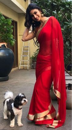 Appealing Georgette Hot Red Saree for Party Red Bollywood Dress For Puja, Red Traditional Drape Dress For Puja, Elegant Red Traditional Wear For Party, Elegant Red Traditional Party Wear, Elegant Red Pre-draped Saree For Puja, Red Saree Dress For Celebration, Elegant Red Saree For Party, Saree Latest Design, Bridesmaids Saree