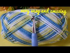 a ball of yarn with a crochet hook in the middle and text overlay that says merry easy and amazing