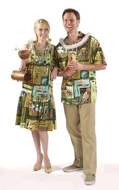 a man and woman dressed in hawaiian clothing