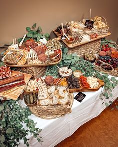 a table topped with lots of different types of food