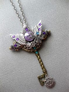 Fantasy Steampunk Key Necklace Listing is for 1 Necklace ☺Fashion ☺Fantasy ☺Magical ☺Imaginative ~ Pendant Height Approximately 3.5 inches (see pics for size comparison against American quarter) ~ Wonderfully and Uniquely made with great attention to detail ~ You Choose Your Chain Length (choose during checkout process) ☻ Link To More Wonderful Items: https://www.etsy.com/shop/FashionCrashJewelry?ref=hdr_shop_menu INTERNATIONAL CUSTOMERS, PLEASE REVIEW MY SHIPPING & POLICIES FOR SHIPPING TIM Metal Key Pendant Jewelry, Key Pendant Jewelry In Metal, Steampunk Jewelry With Keys For Gifts, Vintage Pendant Jewelry With Keys, Vintage Metal Jewelry With Keys Detail, Vintage Metal Jewelry With Two Keys, Vintage Metal Jewelry With Keys, Vintage Metal Key Jewelry, Bohemian Jewelry With Keys As Gift