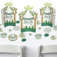 an image of a table setting for a family celebration with paper trees and place settings