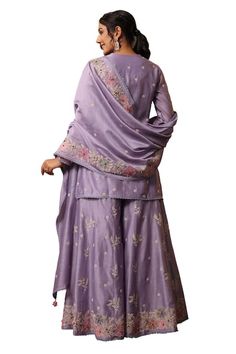 Buy Purple Chanderi Silk Embroidery Thread Notched Kurta Sharara Set For Women by Label Niti Bothra Online at Aza Fashions. Embroidered Raw Silk Palazzo Set With Traditional Drape, Embroidered Raw Silk Palazzo Set, Embroidered Silk Chandbali Sets, Fitted Embroidered Silk Thread Sharara, Silk Thread Sharara With Dori Work For Reception, Fitted Silk Thread Sharara With Traditional Drape, Fitted Silk Thread Sharara With Dupatta, Designer Embroidered Raw Silk Sharara, Art Silk Sharara With Dori Work For Transitional Season