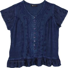 A gorgeous deep blue shade that reminds one of the beautiful medieval lands, this vintage rayon v-neck top stands out from the crowd.  It has short sleeves which is perfect for the summertime, with delicate embroidery featured all over next to the buttons on the front. #tlb #Stonewash #Embroidered #Lace #Misses #vacationclothing #Fall #bohemianfashion #Bluetop #vintagetop #renaissancetop #oldstyletop Indigo Fitted Short Sleeve Top, Indigo V-neck Bohemian Tops, Indigo Bohemian V-neck Top, Bohemian Indigo V-neck Top, Blue Peasant V-neck Top, Blue Peasant Style V-neck Top, Shirt With Embroidery, Bohemian Tunics, Plus Size Tunic