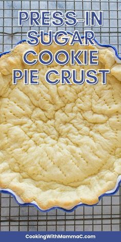 a pie crust on a cooling rack with the words press in sugar cookie pie crust