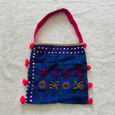 New And Unused. Dimensions Are 13.5 By 14 Inches. Multicolor Embroidered Rectangular Shoulder Bag With Tassels, Rectangular Bags With Multicolor Embroidery And Tassels, Rectangular Shoulder Bag With Multicolor Embroidery And Tassels, Purple Bohemian Shoulder Bag For Summer, Festive Blue Embroidered Bag, Traditional Embroidered Purple Bag, Blue Tassel Bags For Daily Use, Multicolor Embroidered Shoulder Bag With Tassels, Summer Blue Embroidered Shoulder Bag