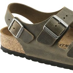 With an added level of security on a classic Birkenstock style, the Milano Sandal is essential for our most active days about town. Signature arch support, cork components, and soft leather deliver the comfort this brand is known for. And an extra buckled strap at the ankle prevents sliding for a more secure fit. The Milano is made with oiled leather for a more classic look or Birkenstock's Birko-Flor for a rugged synthetic design. Adjustable Buckle Footbed Sandals For Outdoor, Adjustable Buckle Closure Footbed Sandals For Outdoor, Classic Leather Footbed Sandals With Adjustable Fit, Classic Adjustable Leather Footbed Sandals, Outdoor Leather Footbed Sandals, Leather Footbed Sandals For Everyday Use, Brown Footbed Sandals With Buckle Closure For Outdoor, Classic Leather Footbed Sandals With Adjustable Strap, Casual Outdoor Footbed Sandals With Adjustable Strap