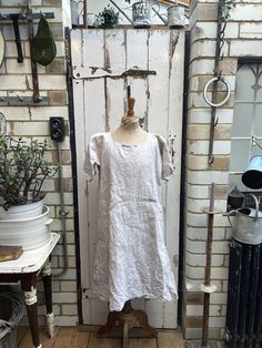 Antique French cream unbleached linen flax dress initials AB size S/M. 100% Linen. Round neck with tie and red initials "AB", short sleeves, side darts, A-line shape - simple shift dress. Size:  Chest: 40 inches; Shoulder to shoulder: 18 inches; Length: 39.5 inches. Weight: 530g (allow 1 kg once packed). Good condition. For a larger selection of similar items, visit my website - www.AntheasAttic.co.uk (link on About page). Please contact me if you would like to buy more than one item and I can c Short Sleeve Flax Linen Dress, Short Sleeve Linen Dress In Flax Color, Fitted Cream Linen Dress, Cream Linen Short Sleeve Dress, Cream Linen Dress With Short Sleeves, Cream Short Sleeve Linen Dress, Flax Dress, French Cream, Dress Clothes For Women