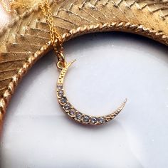 Uncover the ideal present for the special woman in your life with our breathtaking Gold Moon Necklace, showcasing a one-of-a-kind zircon Moon pendant. Enhance her look with this exquisite celestial accessory - perfect for all occasions. ♡ DETAILS  moon: 25 mm- 0.98" Material:  gold plated 24 k over sterling silver 925 , zircon The jewelry is made entirely of 925 sterling silver or  24K gold plated  elements. Gold plated is a sterling silver 925 coated with 24K gold. The elements are covered twic Gold Plated Moon Necklace For Gift, Moon-shaped Cubic Zirconia Jewelry For Gifts, Cubic Zirconia Moon Charm Jewelry, Cubic Zirconia Moon Charm Necklace With Round Pendant, Moon Shaped Cubic Zirconia Jewelry For Gift, Cubic Zirconia Moon Charm Necklace, Gold Moon-shaped Jewelry With Cubic Zirconia, Cubic Zirconia Moon Charm Pendant Jewelry, Elegant Necklace With Moon Charm And Cubic Zirconia