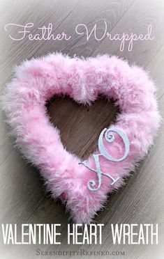 a pink heart with the letter q on it