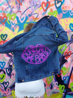 "Oversized, Mid to Dark Wash Denim Jacket with a Painted \"Don't Call Me Baby\" Graphic on the Back. Jacket Does Not Come with Pins, as Pictured. Hand Painted with Washable Textile Fabric Paint (Hand Wash, Hang to Dry). Jacket is a Size 2  \"Boyfriend\" Style. Fits a XS/S. Model 5'2\" **However, Jacket can be purchased with the two FizzPop (High Quality Enamel) Pins on the Front of the Jacket Collar for $145, Message Me For Details**" Call Me Baby, Style Denim Jacket, Upcycled Denim Jacket, Dark Wash Denim Jacket, Painted Denim Jacket, Dont Call Me, Painted Denim, Baby Hands, Custom Jacket