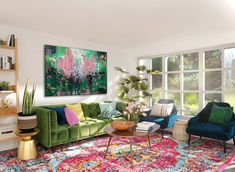 a living room filled with colorful furniture and lots of window sill space next to a large painting on the wall