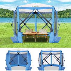 a blue and white gazebo sitting on top of a lush green field next to a picnic table