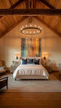 a large bed sitting under a wooden ceiling