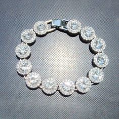 Fabulous Christmas Gift Or For Anytime! New Sparkling Bling Circles Silver Bracelet Tennis Bracelet Fabulous Round/Circle Chain Between Weight & Amount Of Bling.. No One Will Know You Didn't Pay 8 Inches Long Nearly 500 Sparkling Rhinestones Hand Inlaid Number Of Crystals Exceeds 2000! Lead And Nickel Free Hypoallergenic High Grade Plated We Appreciate You! Please Remember Why I Sell..... Proceeds Donated I Donate Proceeds, Pay Posh Fees, May Pay All Or Some Of Your Shipping If I Can, Also Shipp Silver Crystal Bracelet For Party, White Gold Round Crystal Bracelet For Party, White Gold Crystal Bracelet For Party, Sparkling Round Crystal Bracelet For Party, Sparkling Stones Bangle For Party, Party Crystal Bracelet With Sparkling Stones, Crystal Round Bracelet For Party, Party Crystal Bracelet With Bling, Round Crystal Bracelet With Bling As Gift