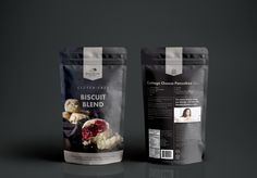 two bags of biscuit blend sitting next to each other on a black surface,