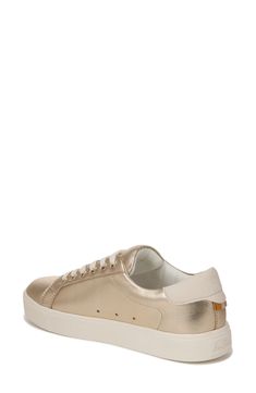 Clean-lined and crisp, this sneaker is a forever-chic style that's as luxe as it is low-key. Removable insole Leather or synthetic upper/synthetic lining and sole Imported Gold Low-top Sneakers With Textured Sole, Gold Lace-up Sneakers With Textured Sole, Trendy Gold Low-top Sneakers, Gold Leather Slip-on Sneakers, Gold Leather Low-top Sneakers, Gold Low-top Sneakers With Contrast Sole, Gold Low-top Modern Sneakers, Casual Gold Low-top Platform Sneakers, Gold Modern Low-top Sneakers