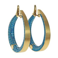 Colored Enamel 18 Karat Yellow Gold Kaleidoscope Hoop Earrings Please take a look at one of our trademark texture in Kaleidoscope Collection - "The Marquise Dots". The enamel color is carefully picked up by our craftsman to match London Blue topaz shade. According to stone in the ring which in a suite with earrings Also please do not miss the Silk finishing, it looks amazingly sparkly when the Sunlight shines on it. Will be glad to share Video with You! Then You can feel design and quality much Share Video, Topaz Color, Latest Jewellery, Jewelry Online Shopping, London Blue Topaz, Jewelry Maker, London Blue, Shopping Store, Online Jewelry