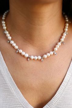 This handmade pearl necklace with zircon stones is made by stringing three pearls and zircon stones respectively. Zircon stones differentiate the design, enhance the beauty and add elegance to this custom pearl choker. Brides can wear this bridal necklace with their wedding dress. This natural freshwater pearl necklace is an excellent choice for a bridesmaid gift, a mother's day gift, a friendship gift or a dainty birthday gift. It's a beautiful way to show someone how much they mean to you. Handmade Pearl Necklace, Pearl Necklaces, Pearl Design, Pearl Choker, Freshwater Pearl Necklaces, Friendship Gifts, Bridal Necklace, Baroque Pearls, Bridesmaid Gift