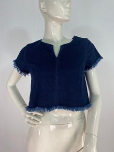 "90s jean crop top, spandex stretch top, size equivalent to small-medium Measurements:  Shoulder 15.5\"/sleeve 4.5\"/bust 16.5\"/length 16.5\"(spandex stretch top, stretches several inches) Mannequin measurements:  5'8\", bust 34\", waist 25\", hip 33\" Please note that vintage clothing sizes can vary greatly.  The Measurements provided  are approximate and are taken lying flat.  I suggest taking a similar garment from your wardrobe and measure it while lying flat.  This way you can compare meas Jean Crop Top, 90s Jean, Top Jean, Crop Top With Jeans, Denim Crop Top, 90s Jeans, Stretch Top, Cropped Tube Top, Jean Top