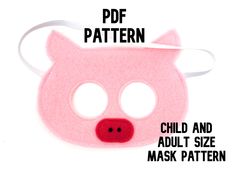 a pink pig mask with the words child and adult size masks on it's face